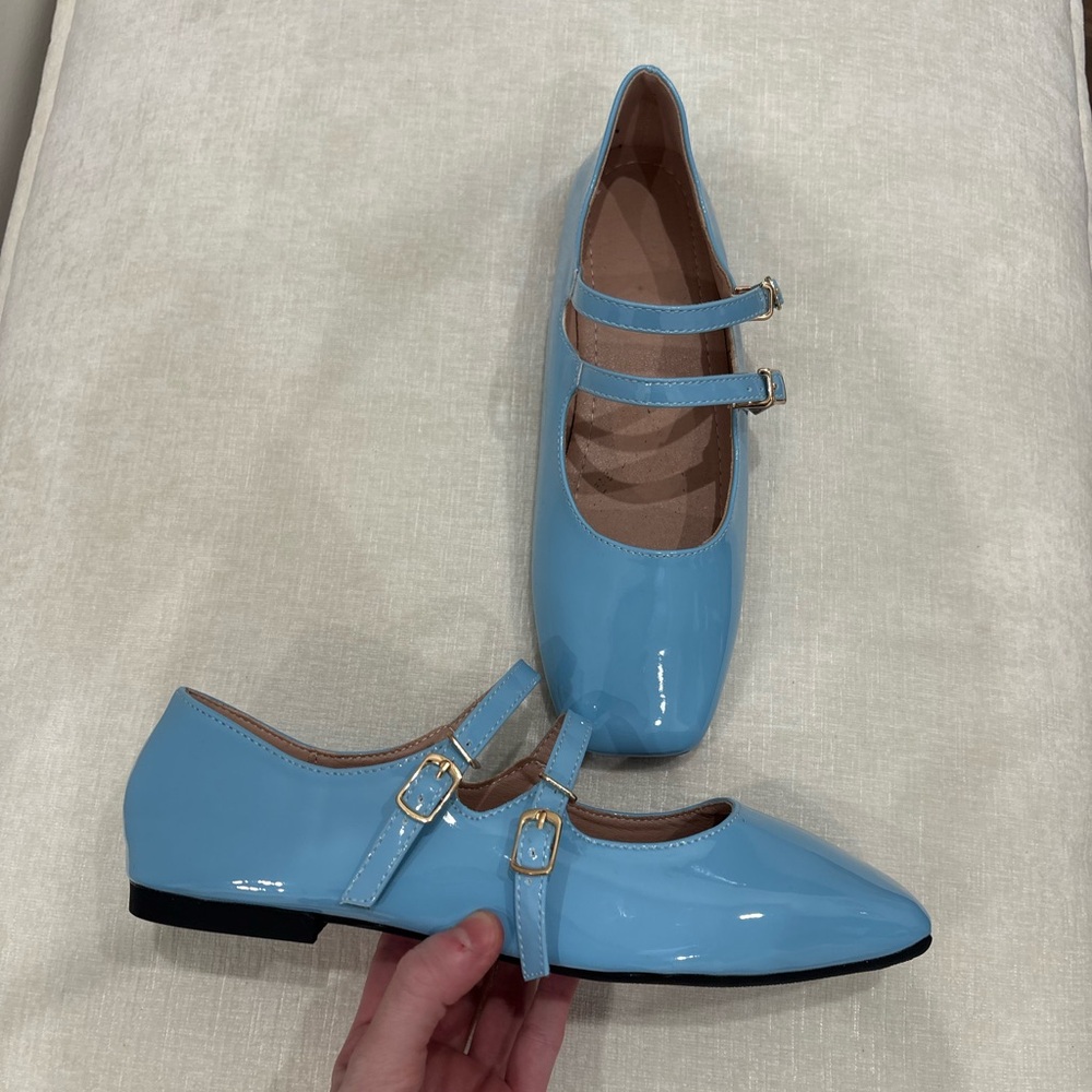 Baby Blue patent leather Mary Jane flats with buckle detail!